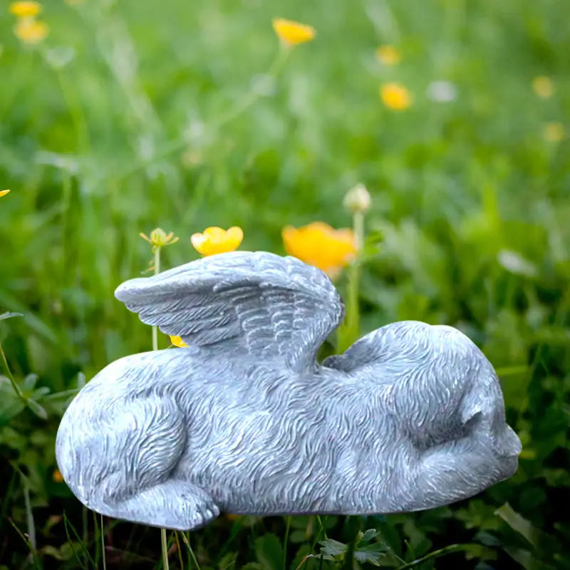 Winged dog statue for Dod Angle Garden decorations in outdoor garden decor setting