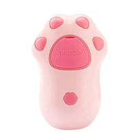 Pink cat paw-shaped pet spa device for gentle grooming with a Cat Spray Comb or spray comb