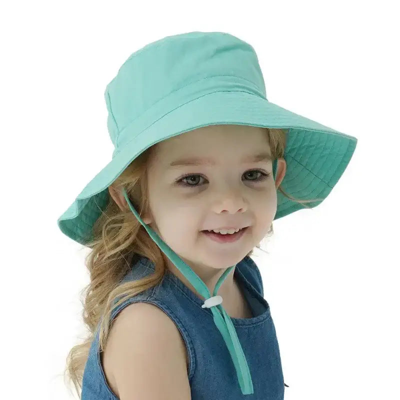 Child’s turquoise sun hat.