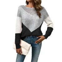 Color-blocked knit sweater.