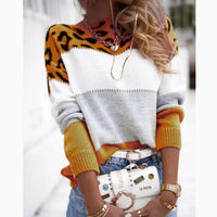 Color-blocked sweater with leopard print.
