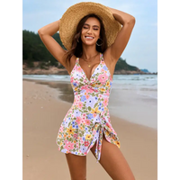 Floral print swimsuit dress.