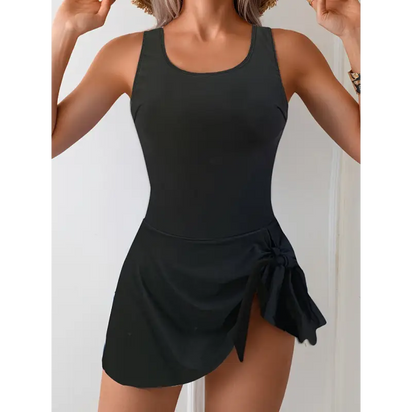 Black one-piece swimsuit with skirt.