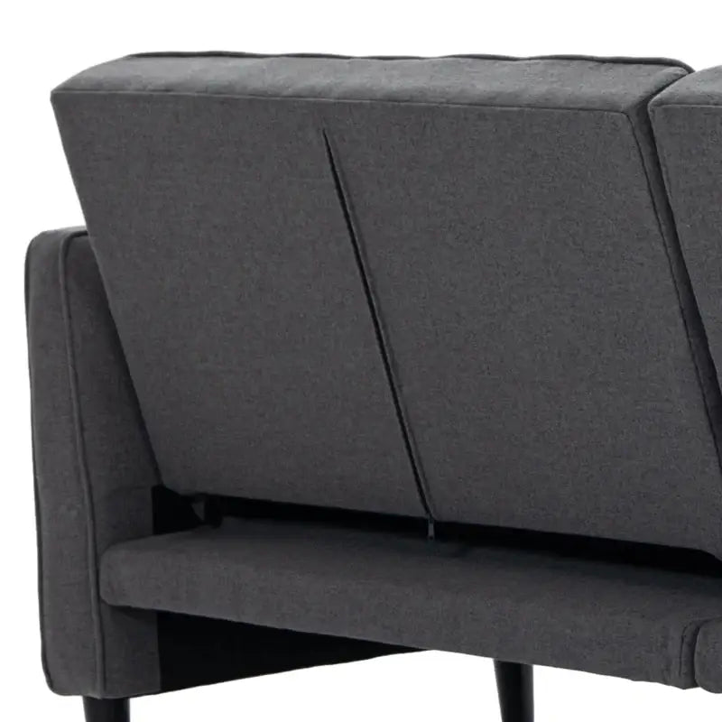 Gray upholstered sofa back.