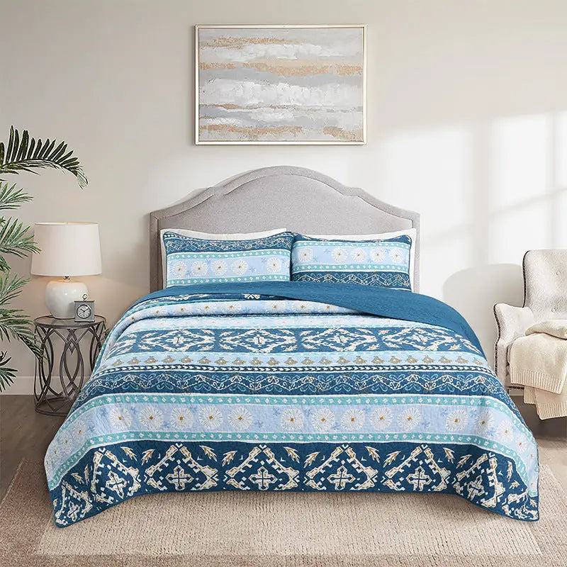 Blue patterned bedspread.