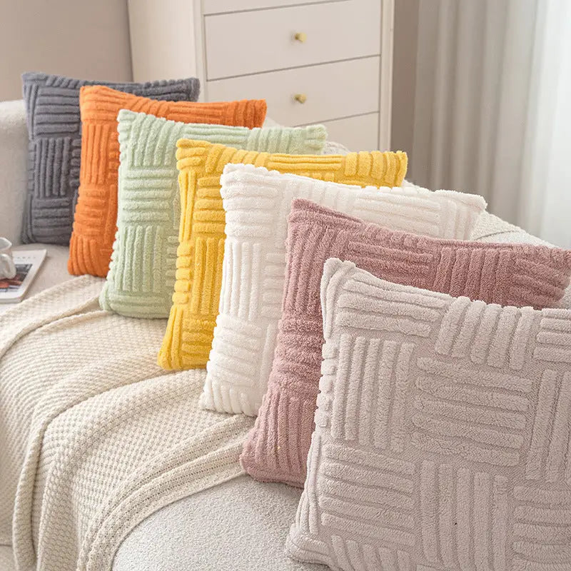 Colorful textured throw pillows.