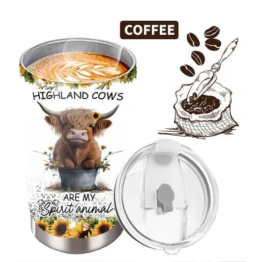 Coffee tumbler with highland cow design.
