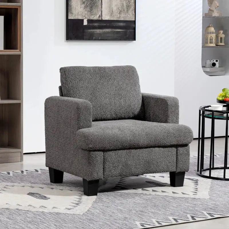Gray upholstered armchair.