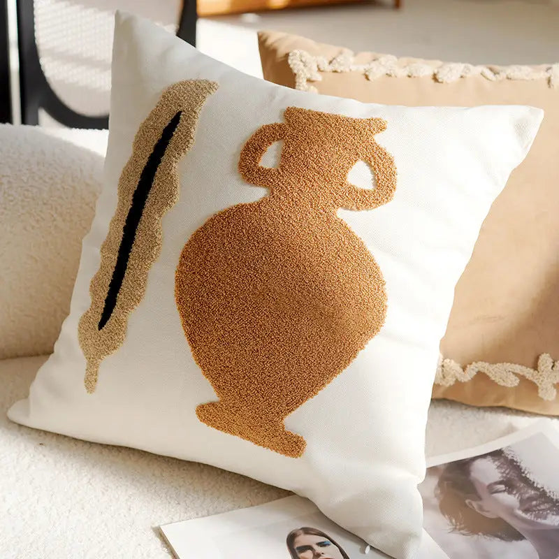 Embroidered decorative pillow.