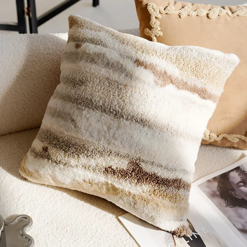 Striped faux fur pillow.