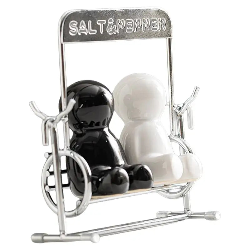 Creative Black and White People Salt Shaker Set with Salt and Pepper Shakers on a Swing