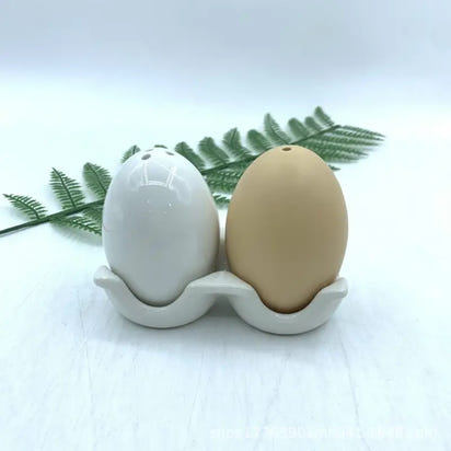 Pun-tastic Egg-Shaped Ceramic Salt Shakers for a fun and stylish kitchen accessory