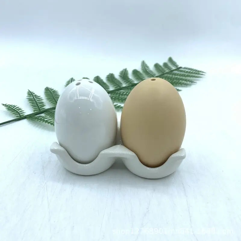 Pun-tastic egg-shaped ceramic salt shakers for fun kitchen decor