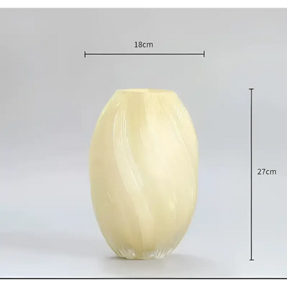 Wrapped, light yellow vase.