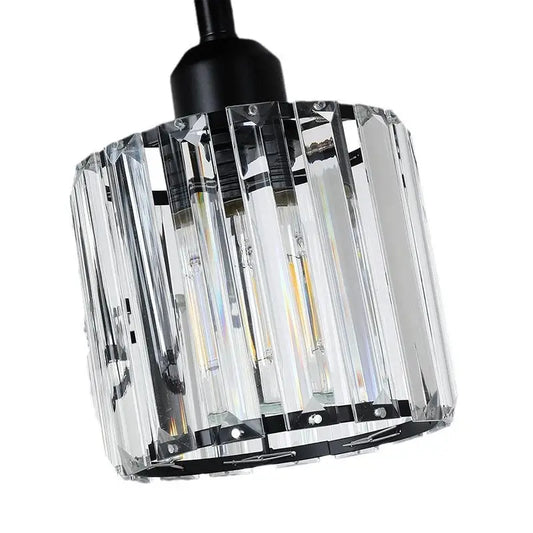Cylindrical crystal pendant light.