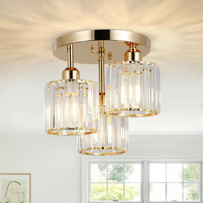 Gold and crystal ceiling light fixture.