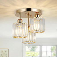 Gold and crystal ceiling light fixture.