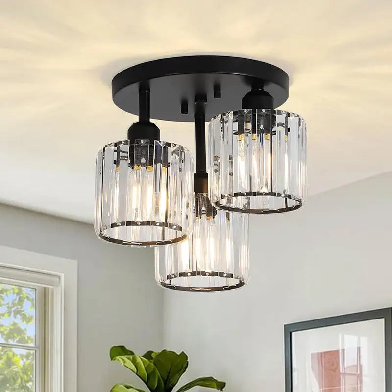 Three-light crystal ceiling fixture.