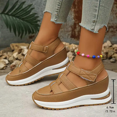 Brown wedge sandals.