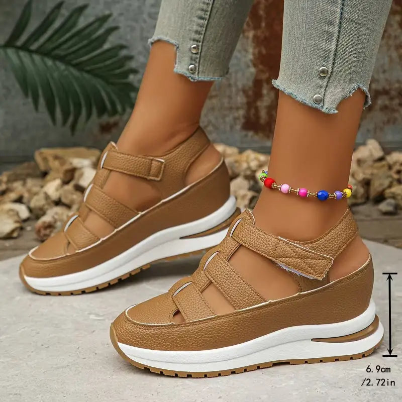 Brown wedge sandals.