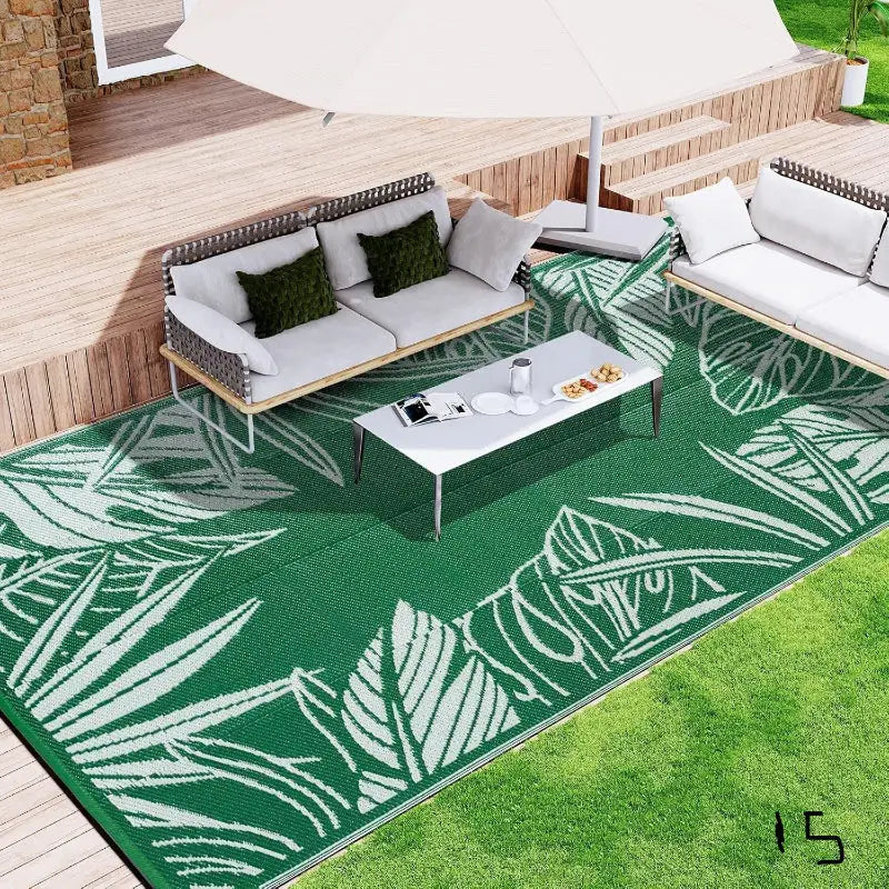 Green and white leaf-patterned decorative home patio outdoor mat for outdoor space