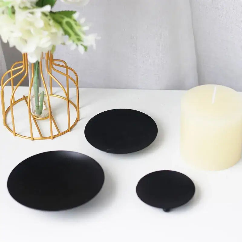 Black candle plates.