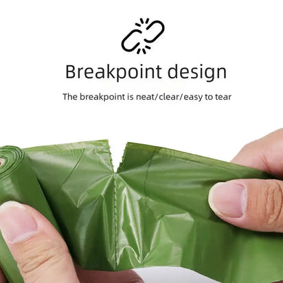 Green dog waste bags with breakpoint design.