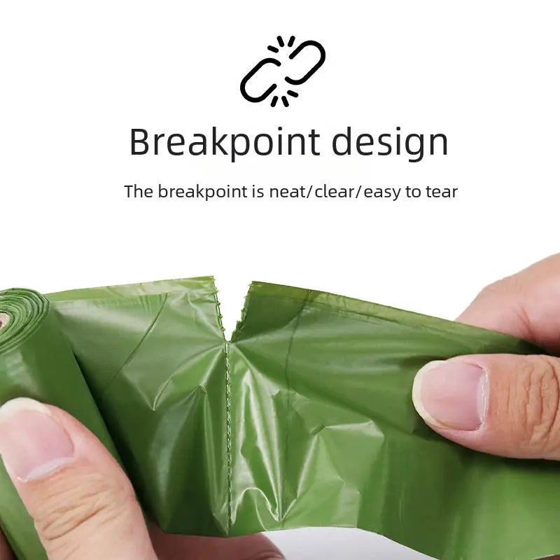 Green dog waste bags with breakpoint design.