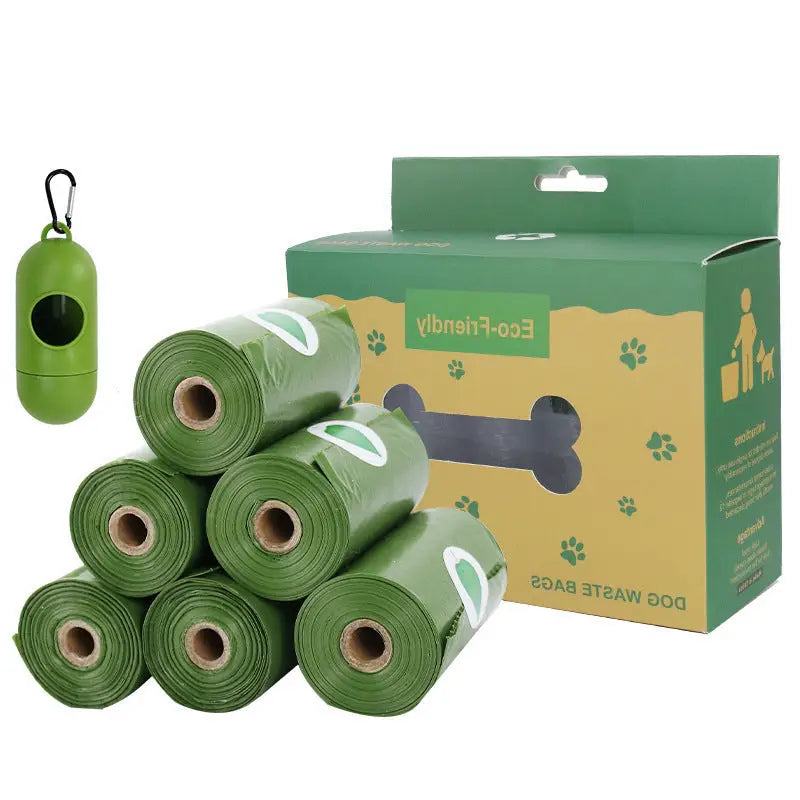 Green dog waste bags with dispenser and box.