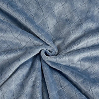 Blue quilted plush fabric.