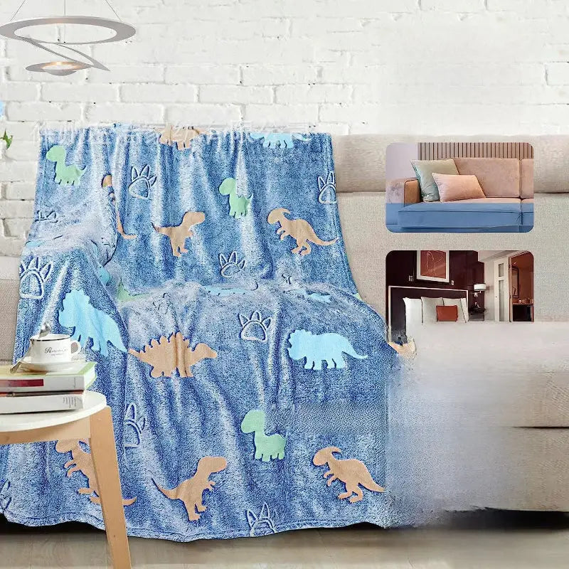 Blue dinosaur-patterned throw blanket.