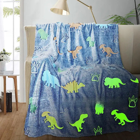 Dinosaur-themed glow-in-the-dark blanket.