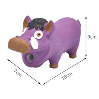 Purple pig-shaped pencil sharpener.