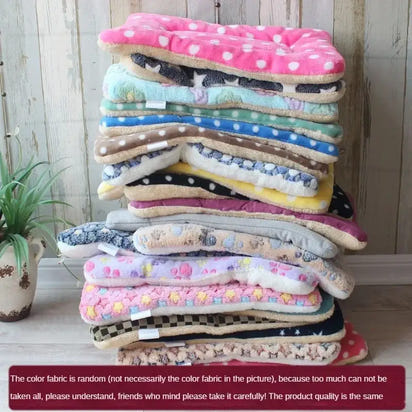 Stack of colorful pet mats.