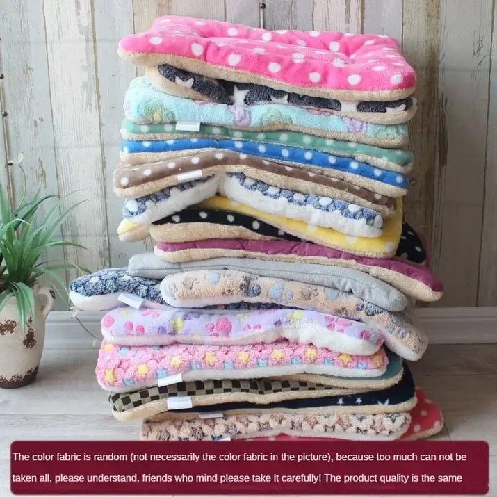 Stack of colorful pet mats.