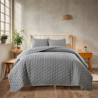Gray quilted bedding set.
