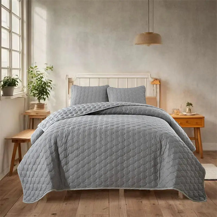 Gray quilted bedding set.