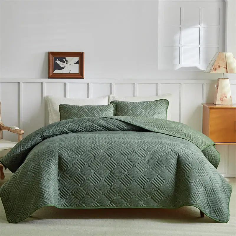 Green quilted bedspread.