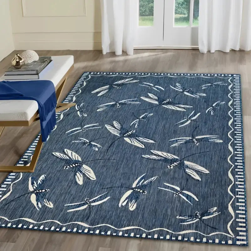 Blue dragonfly patterned rug.