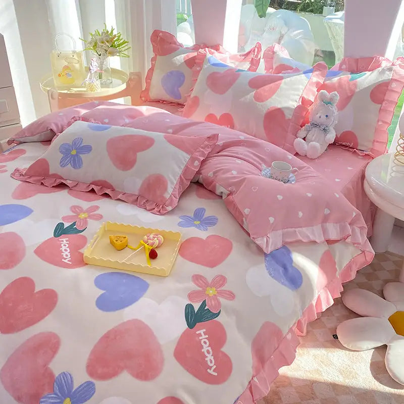 Pink and white heart-patterned bedding.