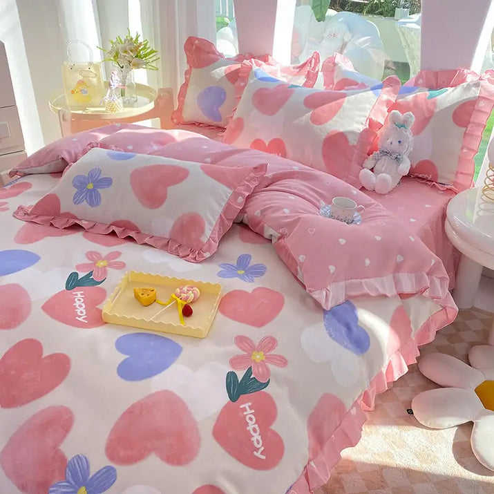 Pink and white heart-patterned bedding.