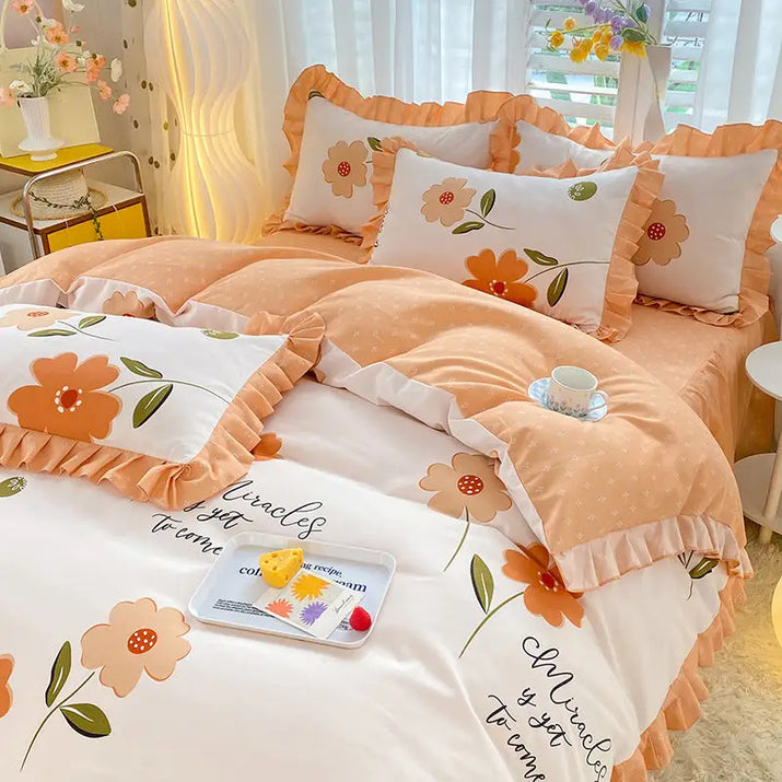 Floral-patterned bedding set with ruffled edges.