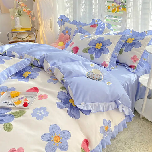 Floral-patterned bedding set with ruffled edges.