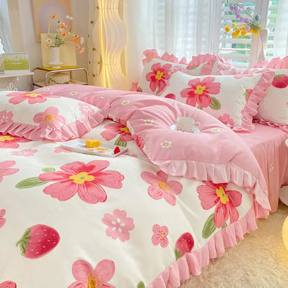 Floral and strawberry patterned bedding.