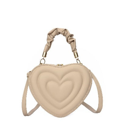 cream heart shaped purse handbag