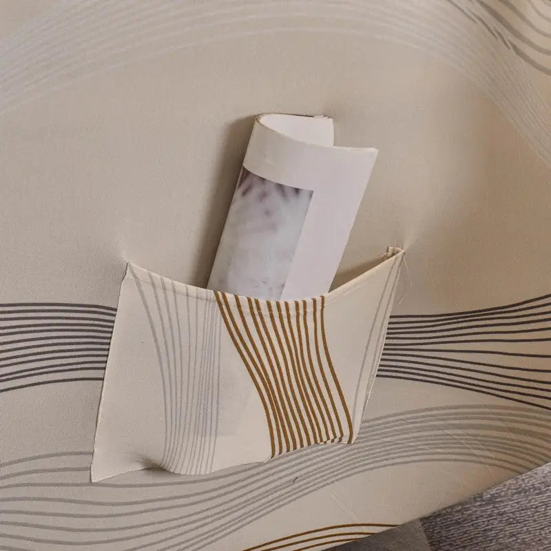 Patterned fabric pocket with rolled paper on Elastic Sofa Cover for stylish protection