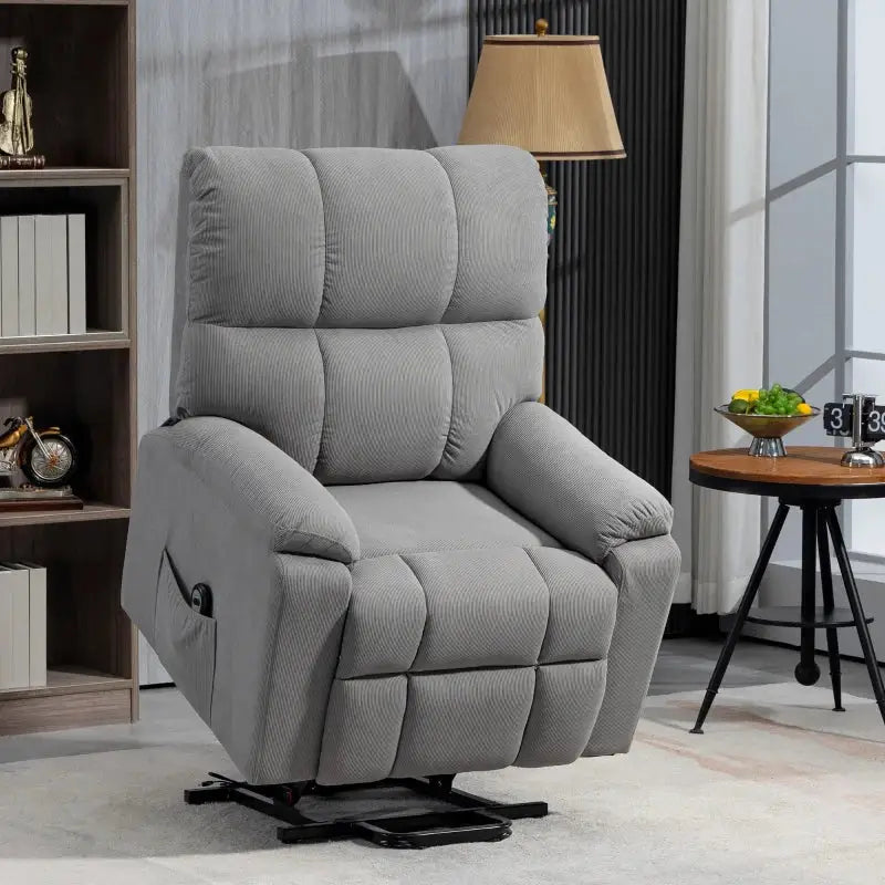 Gray corduroy power lift recliner.