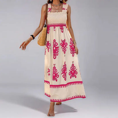 Cream-colored maxi dress with pink floral pattern.