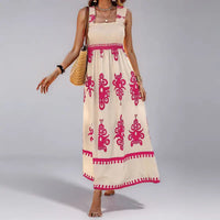 Cream-colored maxi dress with pink floral pattern.