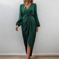 Emerald green satin dress.